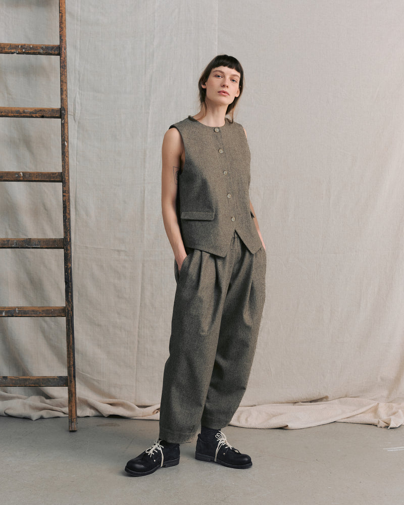 
                  
                    Beige Pleated Pants
                  
                