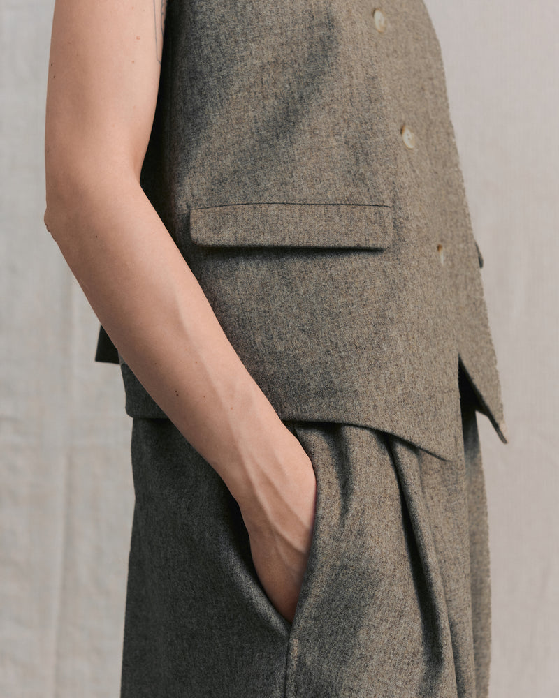 
                  
                    Beige Pleated Pants
                  
                