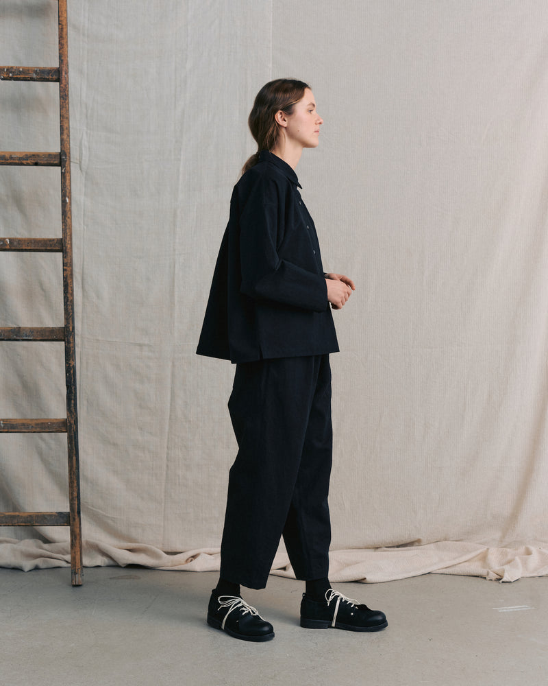 
                  
                    Black Back Pockets Pants
                  
                