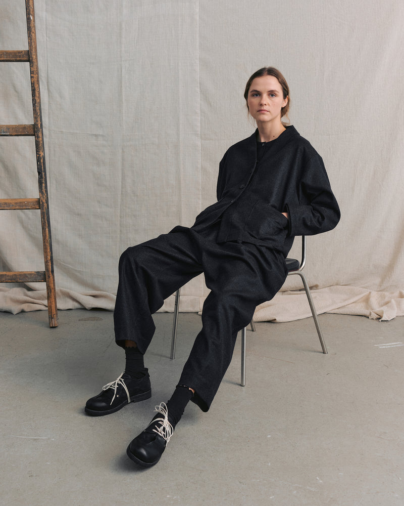 
                  
                    Navy Pleated Pants
                  
                