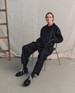 
                  
                    Navy Pleated Pants
                  
                