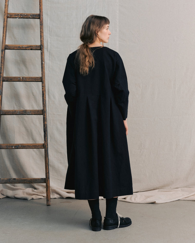 
                  
                    Black Pleated Dress
                  
                