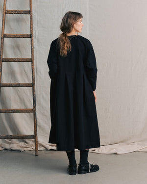 
                  
                    Black Pleated Dress
                  
                