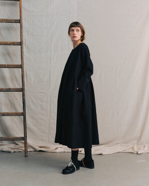 
                  
                    Black Pleated Dress
                  
                