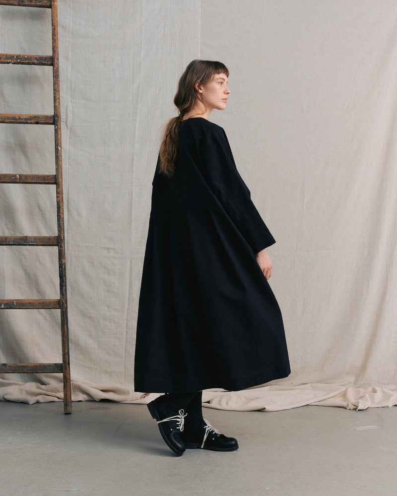 
                  
                    Black Pleated Dress
                  
                