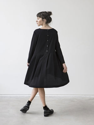 
                  
                    Black Silk Dress with Pleats and Buttons at the Back
                  
                