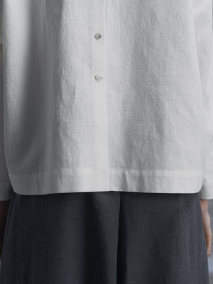 
                  
                    Milk White Top with Buttons at The Back
                  
                