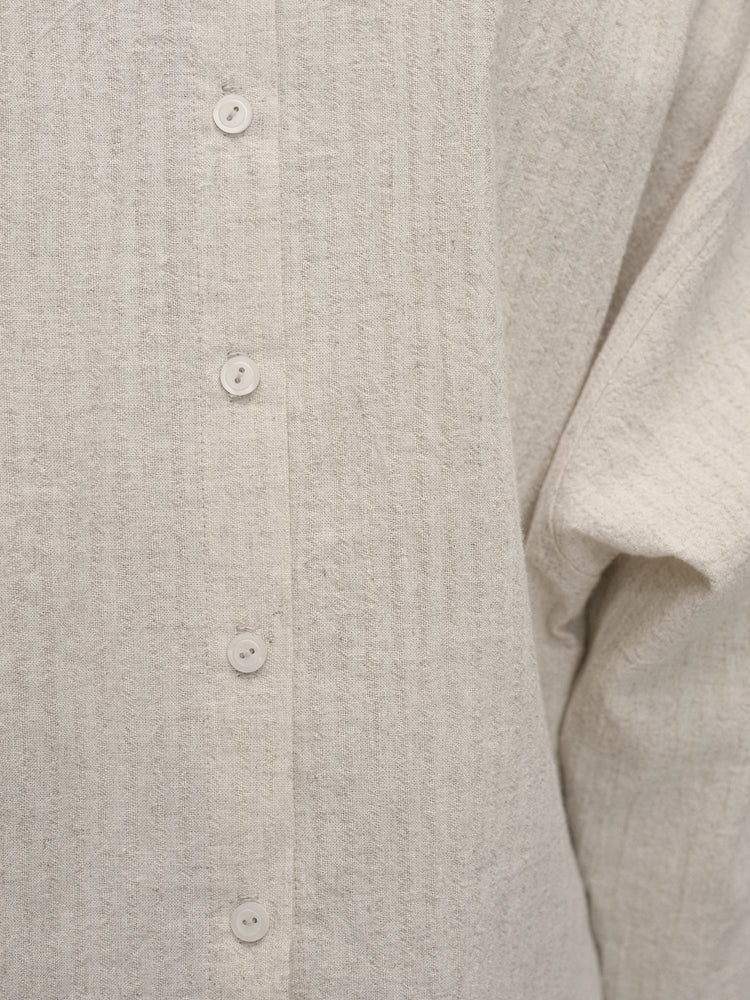 
                  
                    Beige Patterned Shirts with Back Buttons
                  
                