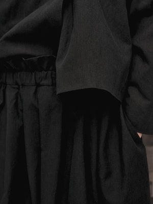 
                  
                    Black Pleated Skirt
                  
                